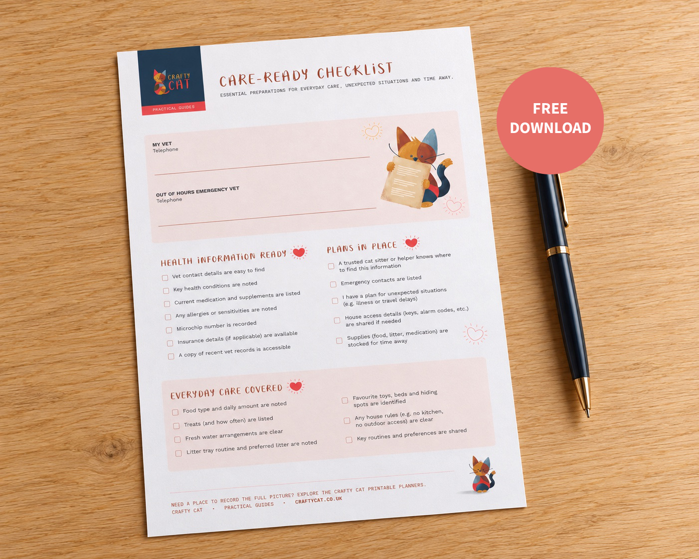 The free Crafty Cat Care-Ready Checklist on a natural wood table with a pen