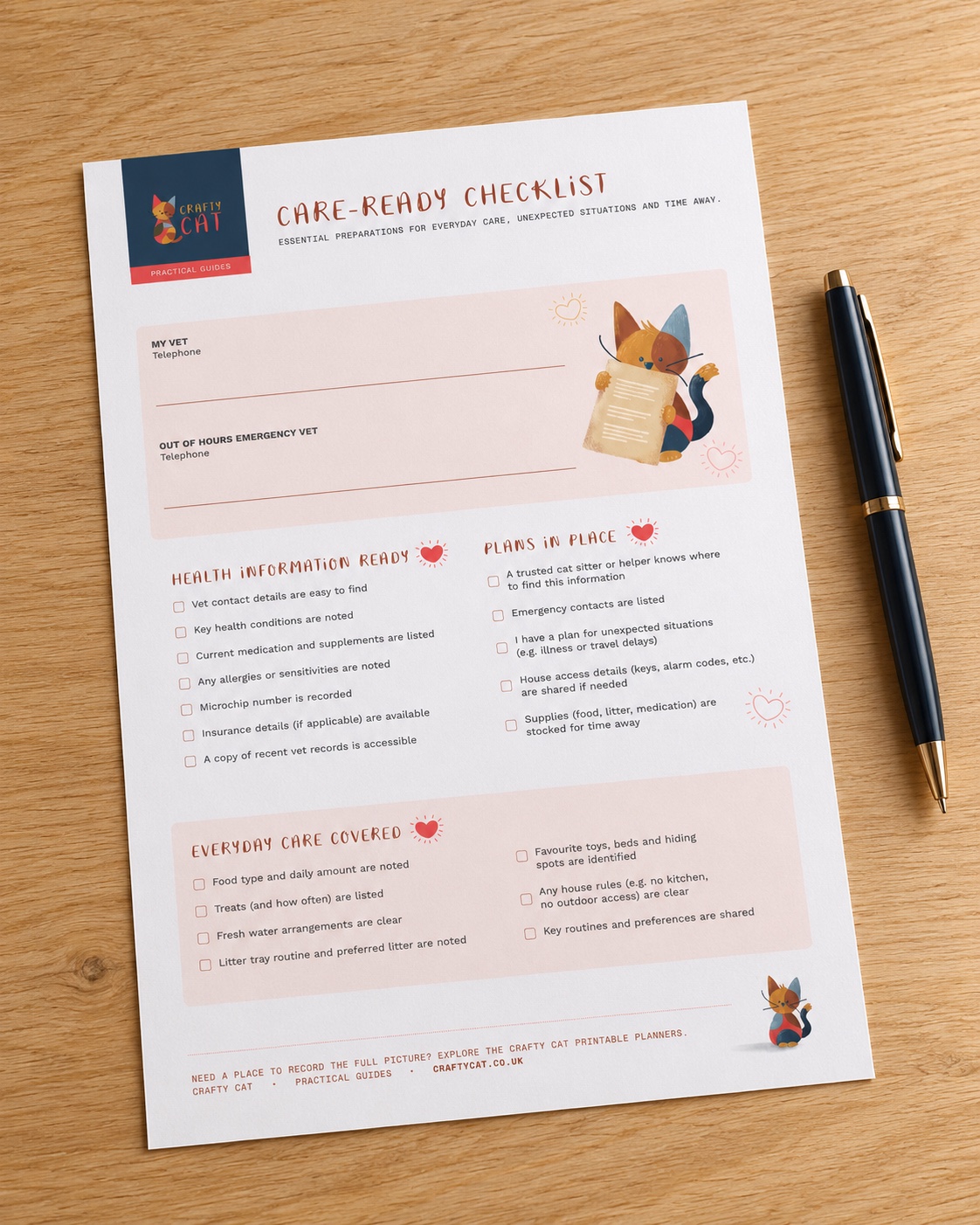 The Crafty Cat Care-Ready Checklist on a natural wood table with a pen